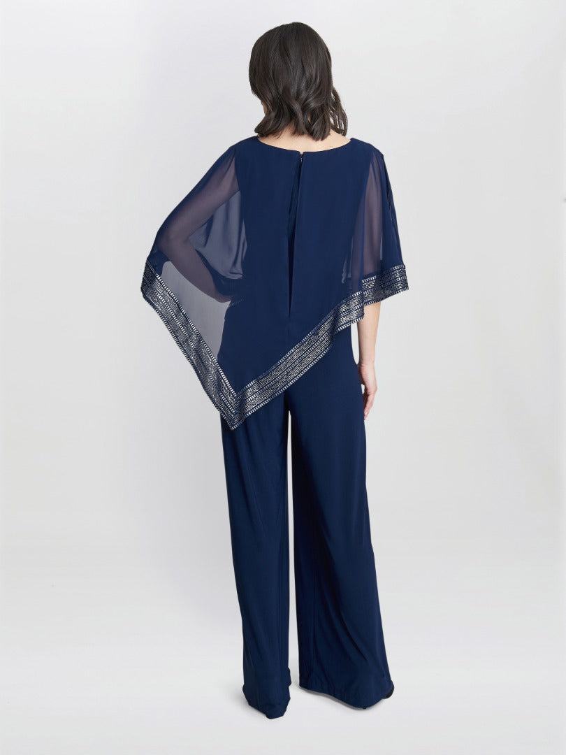  Eve Asymmetrical Cape Jumpsuit With Foil Trim